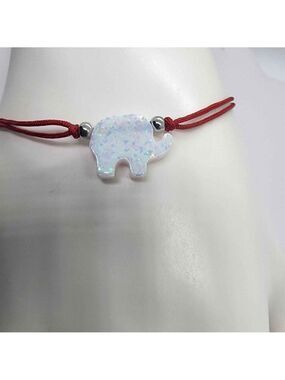 Lucky Glow – White Opal Elephant on Red String Bracelet